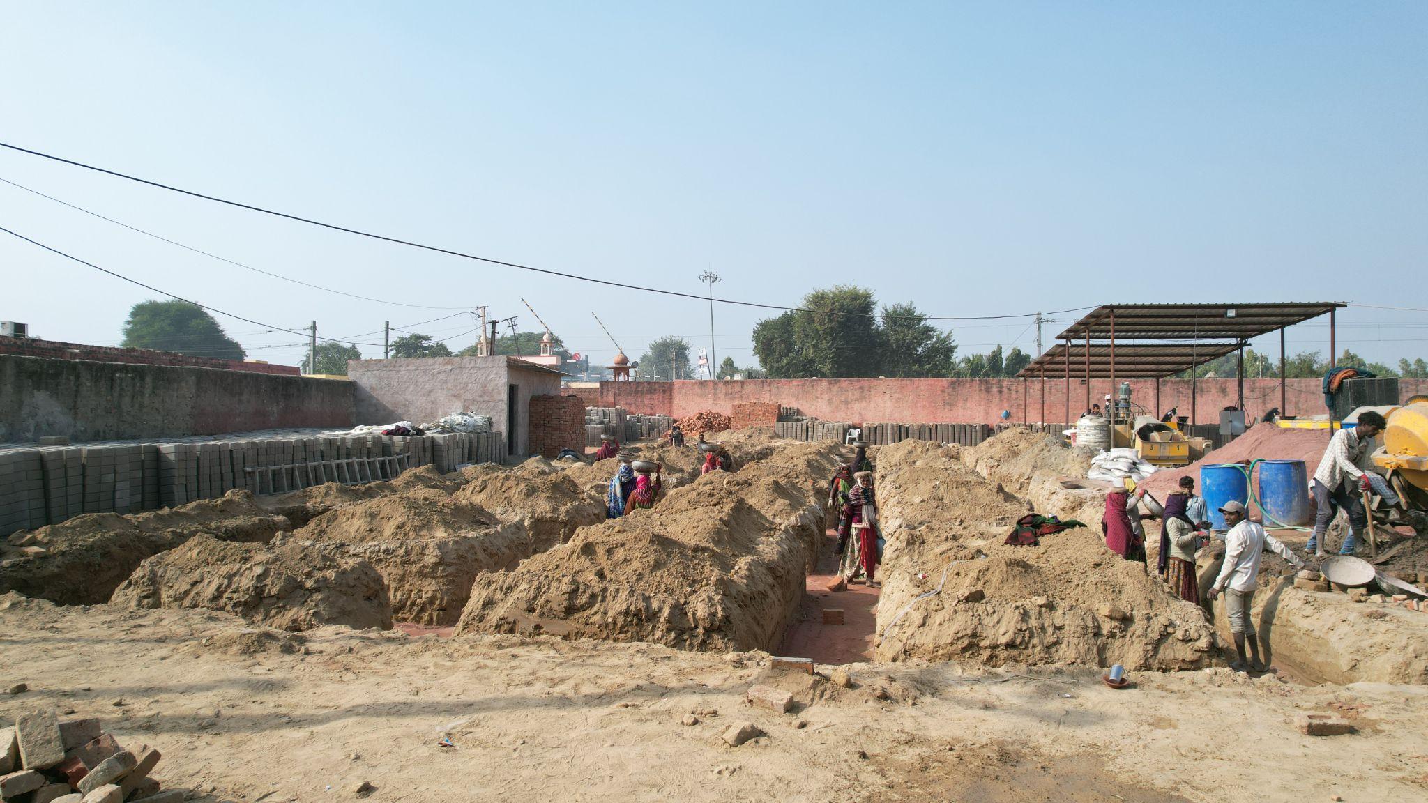 Excavated foundation trench with lean concrete